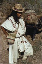 COLOMBIA, Sierra Nevada de Santa Marta, Ika, Ika man in traditional dress with hand-sewn