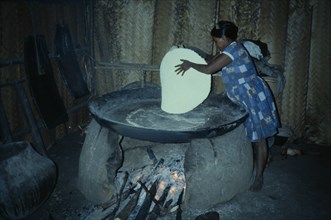 COLOMBIA, North West Amazon, Tukano Indigenous People, Barasana woman making casabe bread from