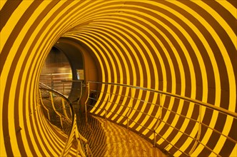 CHINA, Shanghai, Covered walkway at entrance to the Science Museum in Pudong.  Yellow light
