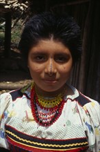 COLOMBIA, Darien, Kuna Indians, Head and shoulders portrait of Kuna girl from the Arquia community