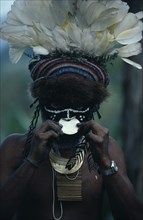 PAPUA NEW GUINEA, Mount Hagen, People, "Portrait of man wearing traditional dress and jewellery,