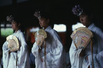 JAPAN, Honshu, Nara, "At Kasuga Shrine, the shrine maidens, miki, perform one of the sacred kagura