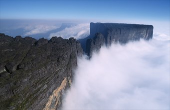 VENEZUELA,  Bolivar State, Canaima National Park, Kukenan Tepuy table-top mountain with low clouds