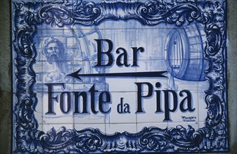 PORTUGAL, Sintra, Detail of typical blue tiles advertising Bar Fonte da Pipa