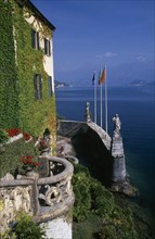 ITALY, Lombardy, Lake Como, "Villa Balbianello.  Part view of ivy and virginia creeper covered