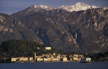 ITALY, Lombardy, Lake Como, Ballagio. View across Lake Como towards distant town of Ballagio