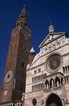 ITALY, Lombardy, Cremona, Piazza del Comune.  Part view of the Duomo facade and rose window beside