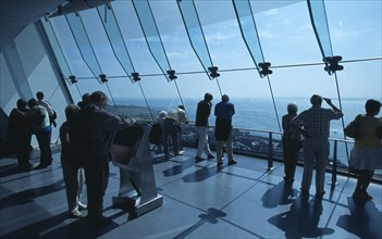 ENGLAND, Hampshire, Portsmouth, "Gunwharf Quays.The Spinnaker Tower. Interior with visitors looking