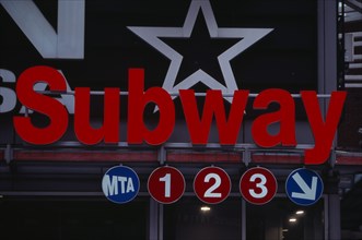 USA, New York, New York City, Red subway sign on 34th Street / 7th Avenue.