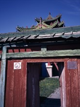 MONGOLIA, Ulaan Baatar, Winter Palace of Bogd Khaan. Section of wooden doorway and roof