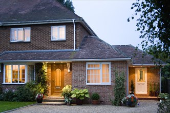ARCHITECTURE, Buildings, Homes, Semi detached house brick built and garden with gravel driveway at