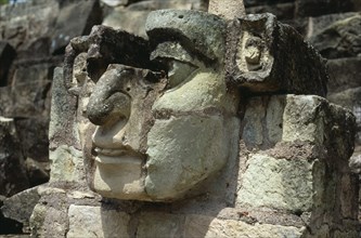 HONDURAS, Copan, "Site of ancient Mayan ruins.  Detail of carved stone face, partly complete,