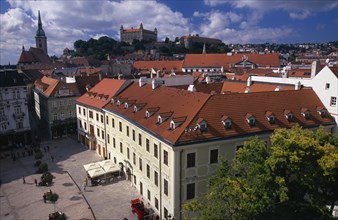 SLOVAKIA, Bratislava, View over paved square and red tiled rooftops of the Old Town towards
