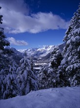 FRANCE, Provence-Cote d’Azur, Hautes-Alpes, View west from Col de Montgenevre over snow covered