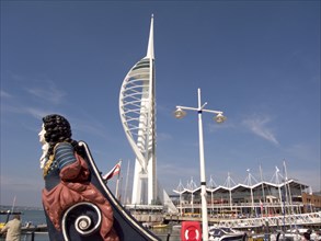 ENGLAND, Hampshire, Portsmouth, Gunwharf Quays. The Spinnaker Tower with figurehead in the