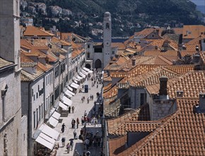 CROATIA, Dalmatia, Split, "Elevated view over terracotta tiled rooftops and Stradun, the main