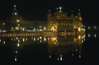 INDIA, Punjab, Amritsar, The Golden Temple illuminated at night