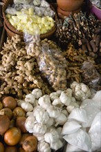WEST INDIES, St Lucia, Castries, "Market stall with local produce of herbs and spices including