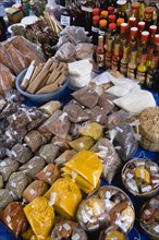 WEST INDIES, St Lucia, Castries, "Market stall with packets of locally produced herbs, spices and