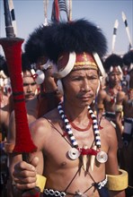 INDIA, Rajasthan, Jaipur, Portrait of a male tribal dancer from Nagaland at the Jaipur Heritage