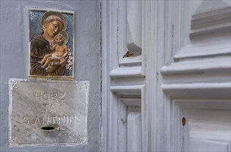 MALTA, Valletta, Collection box for Saint Anthony in a doorway on Republic Street with a small