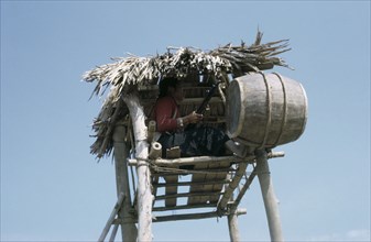 VIETNAM, North , Hung Yen Province, Female soldier in air raid look-out tower.