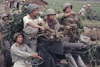 VIETNAM, North , War, North Vietnamese soldiers with anti aircraft missile launcher.