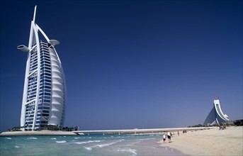 UAE, Dubai , Burj-al-Arab Hotel with the Jumeirah Beach Hotel behind.