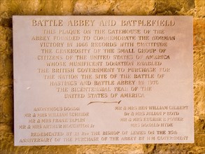 ENGLAND, East Sussex, Battle, Battle Abbey. Battlefield Plaque on stone wall by the gatehouse