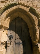 ENGLAND, East Sussex, Battle, Battle Abbey. Detail of wooden gate