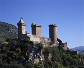 FRANCE, Midi-Pyrenees, Ariege, Chateau Foix on rocky hilltop above town.  Built on 7th century