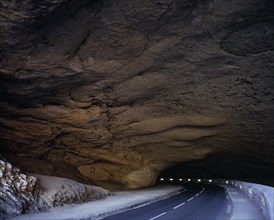 FRANCE, Midi-Pyrenees, Ariege, Grotte du Mas d’Azil drive through cave.  North entrance.