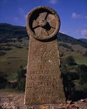 FRANCE, Midi-Pyrenees, Ariege, Chateau de Montsegur.    Carved stone erected to the memory of 200