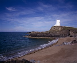 WALES, Isle of Anglesey, Llanddwyn Island, "Curving, empty beach overlooked by old lighthouse