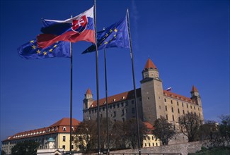 SLOVAKIA, Bratislava, "Flags flying outside Bratislava Castle, reconstructed 1956-68 after burning