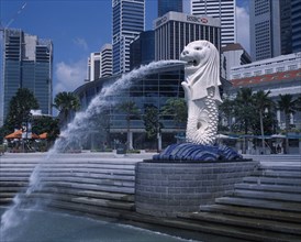 SINGAPORE, Merlion Park, "The Merlion statue at the Merlion Park river entrance with HSBC Bank,