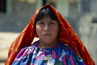 PANAMA, San Blas Islands, Kuna Indigenous Tribe, Portrait of young Kuna Indian girl wearing