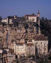 FRANCE, Midi-Pyrenees, Lot, Rocamadour.  Chateau on clifftop with 12th century Basilica of