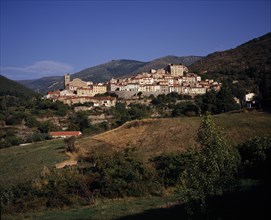 FRANCE, Languedoc-Roussillon, Pyrenees-Orientales, Mosset. View towards hillside village from the