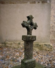 FRANCE, Languedoc-Roussillon, Aude, Fanjeaux.  Ancient stone cross outside the thirteenth century