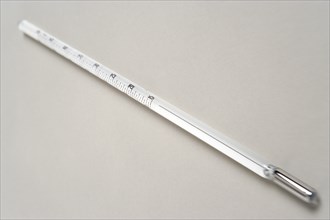 SCIENCE, Medical, Measurement, White mercury thermometer showing temperature scale and rising