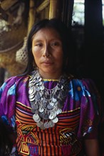 COLOMBIA, Darien, Kuna Indigenous Tribe, Three-quarter portrait of Kuna Indian woman from the