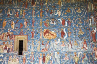 ROMANIA, Moldavia, Bucovina, "Frescoes on outside south wall, Voronet Monastery, near Gura