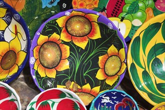 MEXICO, Yucatan, Chichen Itza, Colourful plates and bowls for sale