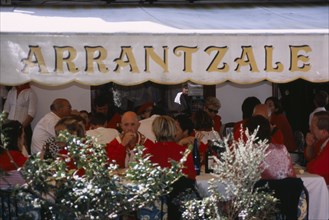 SPAIN, Pais Vasco, Hondarrabia, Cafe with locals and tourists during the annual festival