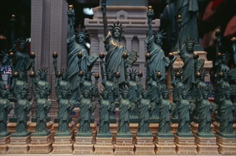 USA, New York, New York City, Statue of Liberty souvenirs for sale on 31st Street.