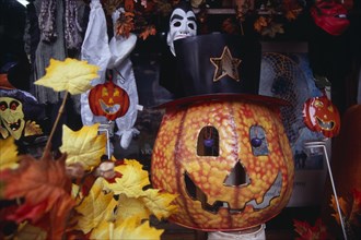 USA, New York, New York City, Display of masks and costumes for Halloween in shop on West 34th