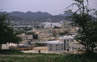 OMAN, Muscat, City view with mountains beyond.