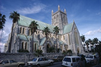 BERMUDA, Hamilton, Cathedral of the Most Holy Trinity.  Exterior with busy street in foreground.