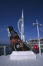 ENGLAND, Hampshire, Portsmouth, Gunwharf Keys. The Spinnaker Tower with figurehead in the